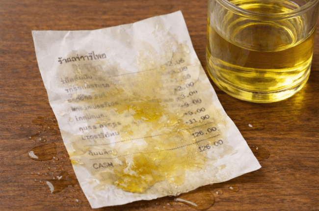 กระดาษพิมพ์ใบเสร็จเลอะน้ำมัน